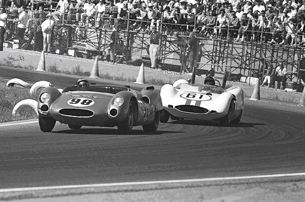 Dave MacDonald whips Shelby King Cobra CM/1/63 past Dan Gurney's Lotus